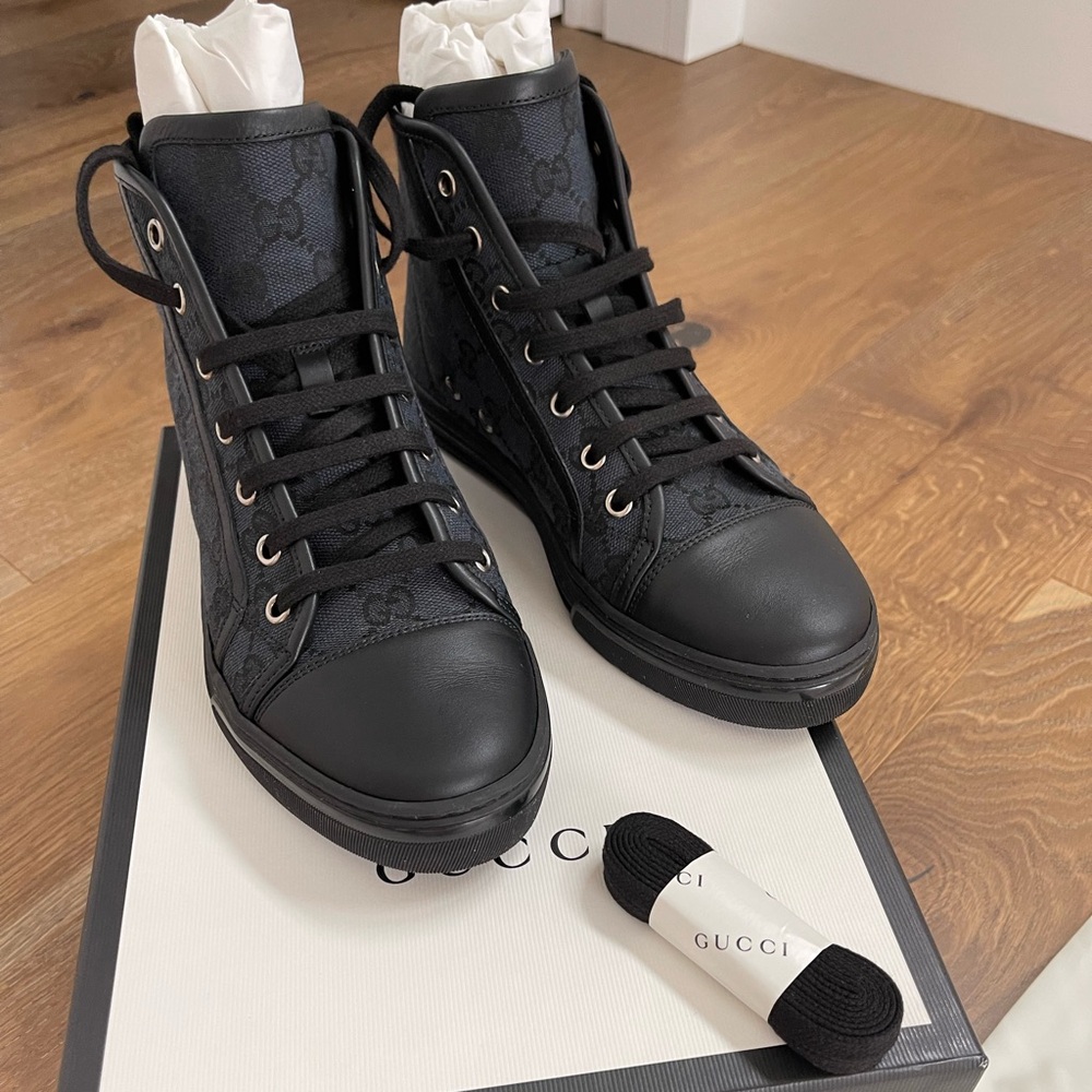 Woman’s Gucci chuck sneakers